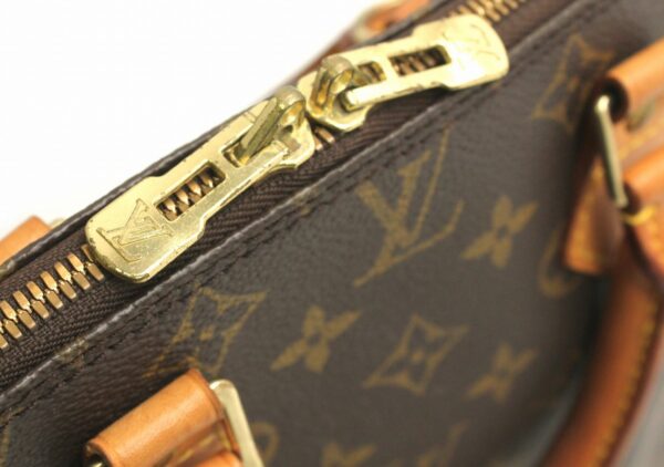 11660877 5 Louis Vuitton Monogram Alma Handbag Brown