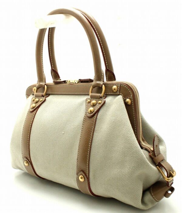 11661885 1 Louis Vuitton Toal Trianon Antigua Sac de Nuit MM Handbag Canvas Beige