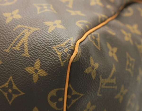 11670199 2 Louis Vuitton Monogram Keepall 55 Bag Canvas Brown