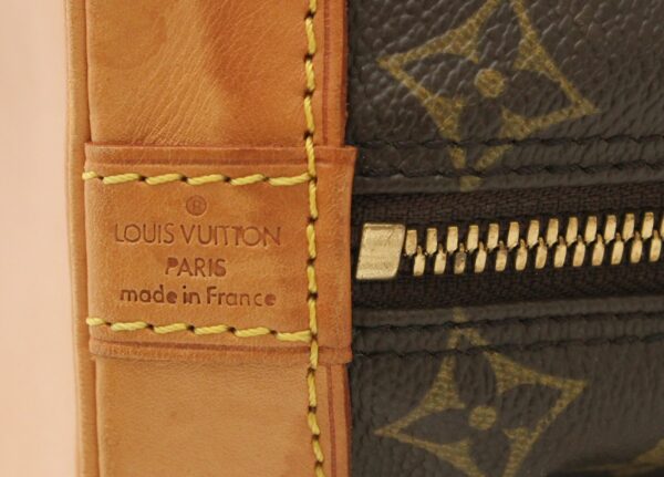 11670429 8 Louis Vuitton Monogram Alma Handbag Canvas Brown