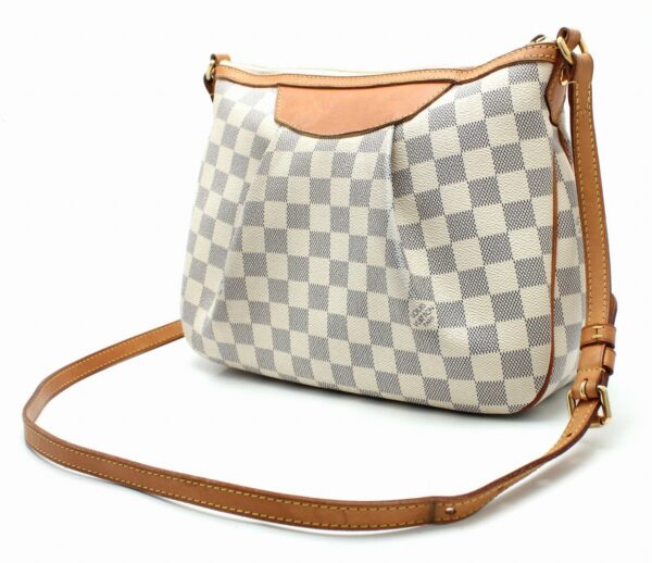 11670834 1 Louis Vuitton Damier Azur Syracuse PM Handbag Canvas White