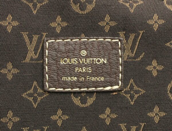 11671274 8 Louis Vuitton Monogram Minilan Saumur 30 Shoulder Bag Canvas Brown