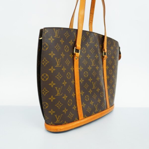 1240001051425 2 Louis Vuitton Babylon Monogram Shoulder Bag Brown