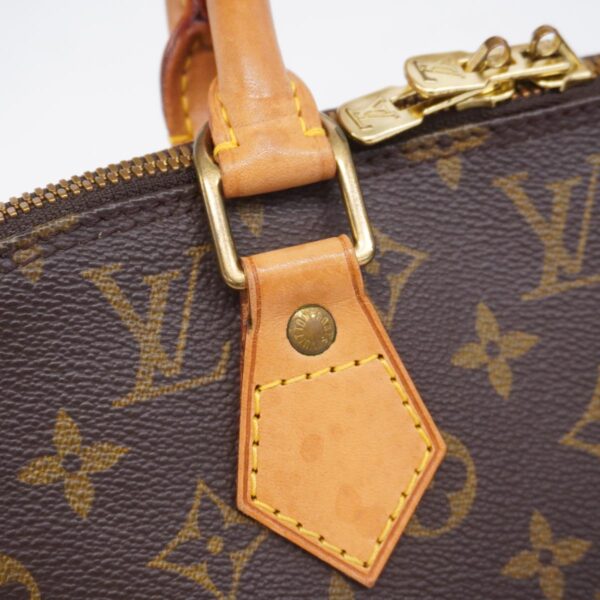 1240001051645 11 Louis Vuitton Alma Monogram Handbag Brown