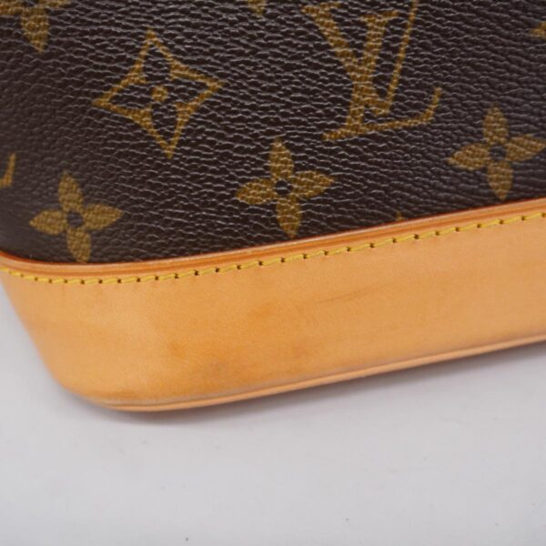 1240001052506 12 Louis Vuitton Alma Monogram Handbag Brown