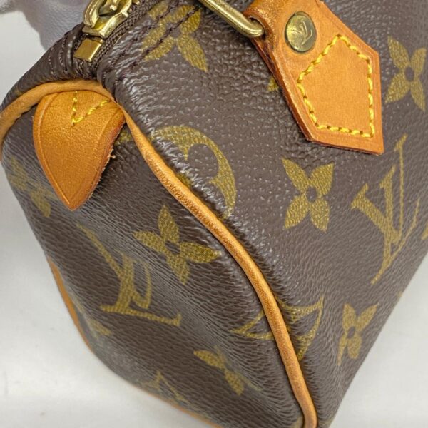 1240001052754 11 Louis Vuitton Mini Speedy Monogram Handbag Brown