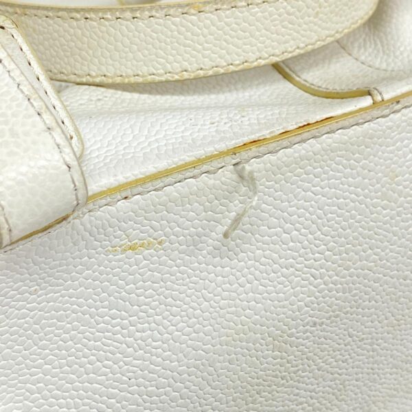 1240001052868 8 Chanel Caviar Skin Rucksack White