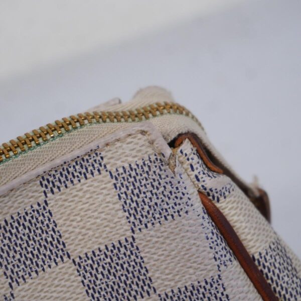 1240001052979 17 Louis Vuitton Eva Damier Azur Handbag White