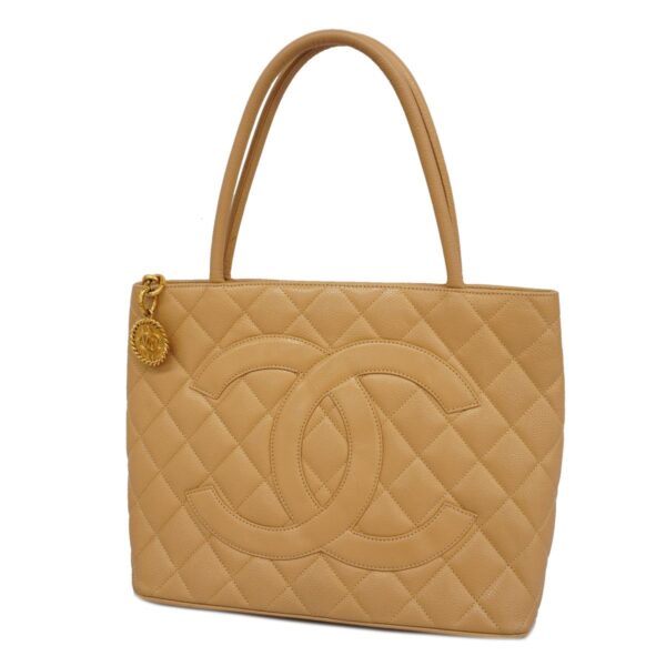 1240001054932 1 Chanel Caviar Skin Tote Bag Beige