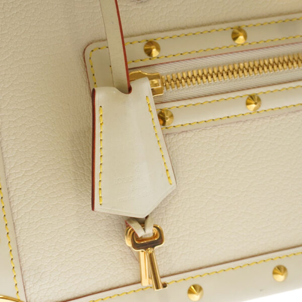 21 3220 10 Louis Vuitton Fabureau Suhali Leather Handbag Off White