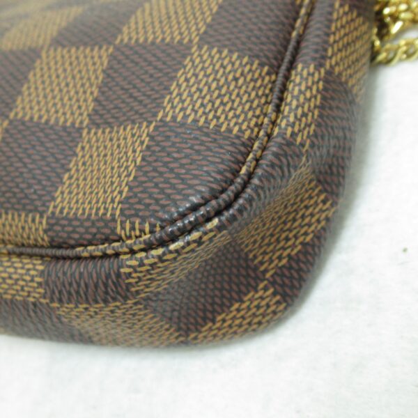 2100301102996 7 Louis Vuitton Mini Pochette Accessoire Pouch Damier Brown