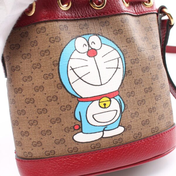 2101218059915 5 Gucci Doraemon Mini Bucket Bag Gg Supreme Brown