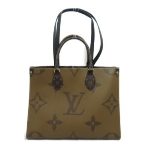 2101218073317 2 Louis Vuitton Pochette Ganju Monogram Bag Brown