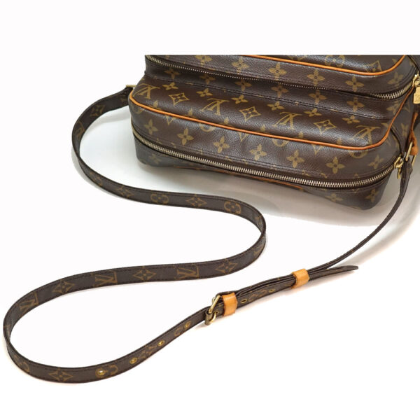 22 315 8 Louis Vuitton Nile Monogram Canvas Shoulder Bag Brown