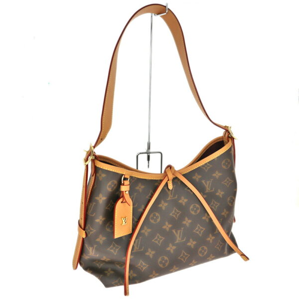 23 2169 1 Louis Vuitton Carryall NM Monogram Tote Bag