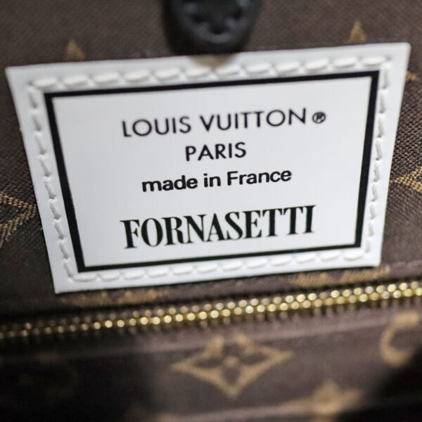 23 3452 12 Louis Vuitton On the Go MM Fornasetti Handbag