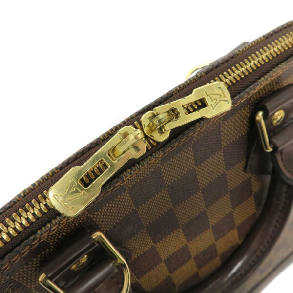 230090012 Louis Vuitton Alma Damier Ebene Handbag