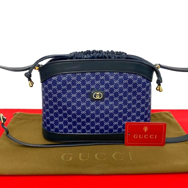 497a2179283 1 Gucci Micro GG Leather Drawstring Shoulder Bag Pochette Navy