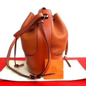 500a243415021 1 Louis Vuitton Monogram Rivoli Handbag Brown