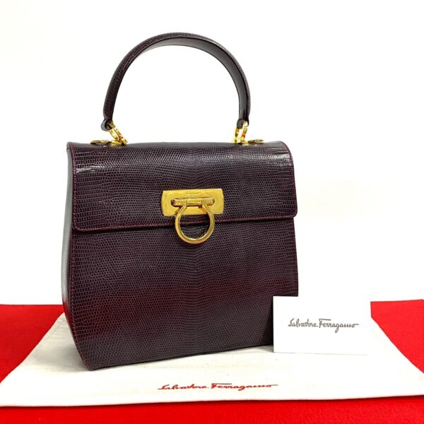 526c3007370 1 Salvatore Ferragamo Gancini Lizard Leather Mini Bag Purple