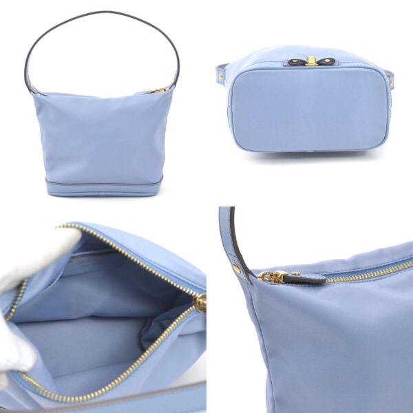 55590g 2 c Salvatore Ferragamo Rose Nylon Handbag Blue