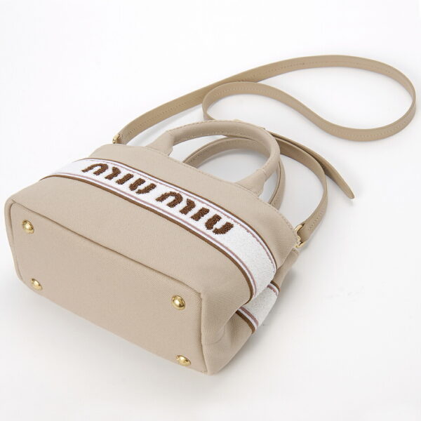 5ba2532f68f0065oro 1 Miu Miu Canvas Ricamo Handbag Beige