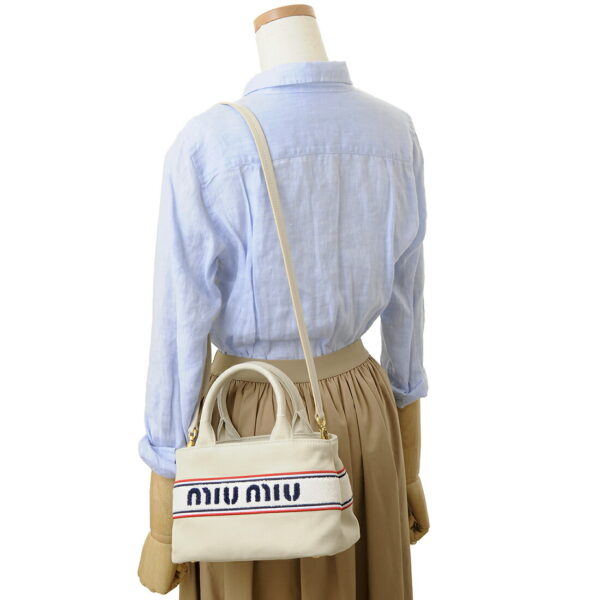 5ba2532f68f0354oro 4 Miu Miu Canvas Ricamo Handbag White