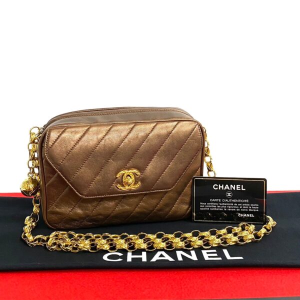 779c779 22072 1 Chanel Coco Mark Lambskin Chain Mini Pochette Brown