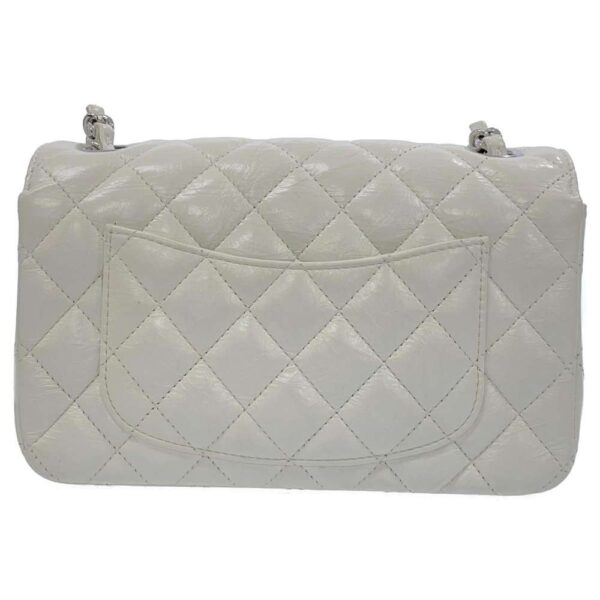 9213562 03 Chanel Coco Mark Calfskin Mini Flap Bag White