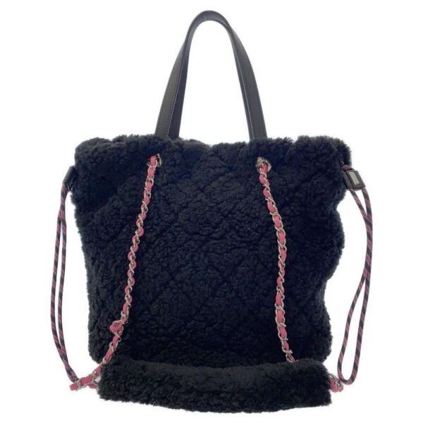 9252097 03 Chanel Coco Mark Coconage Tweed Mouton Drawstring Bag Black