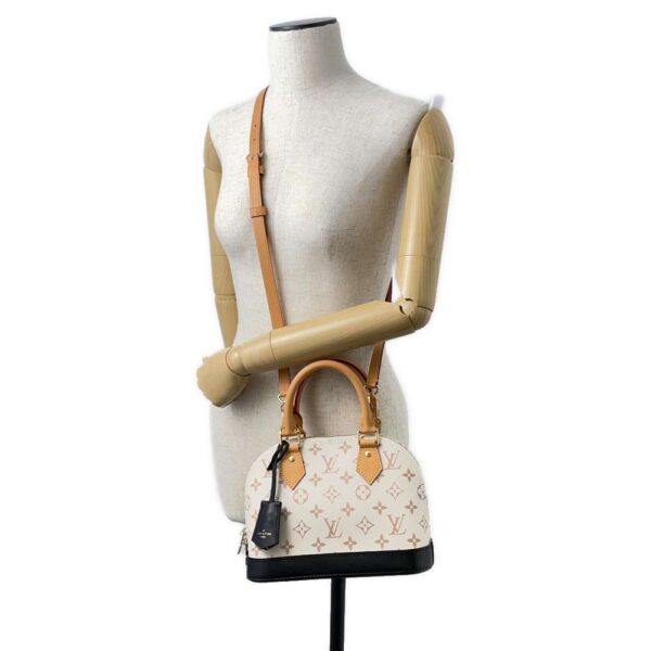 9386198 05 Louis Vuitton Alma BB Monogram Reverse Handbag