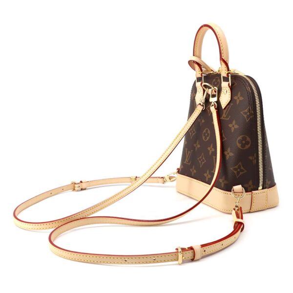 9454446 02 Louis Vuitton Alma Monogram Rucksack Brown