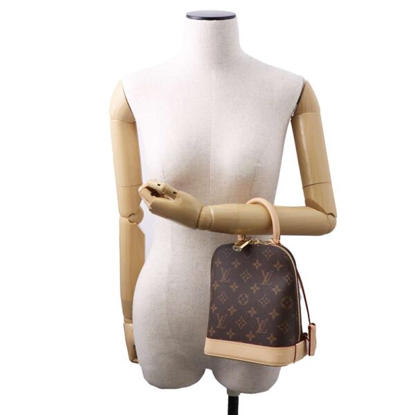 9454446 04 Louis Vuitton Alma Monogram Rucksack Brown