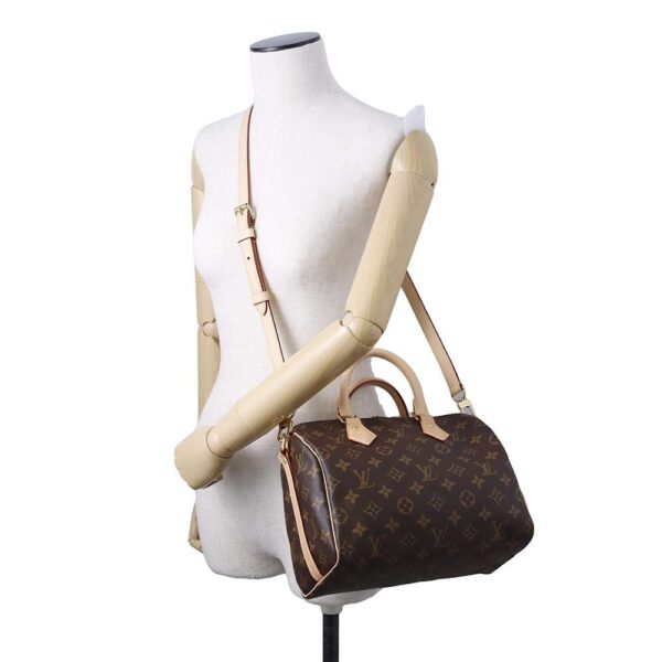 9465336 05 Louis Vuitton Speedy Bandouliere 25 Monogram Handbag