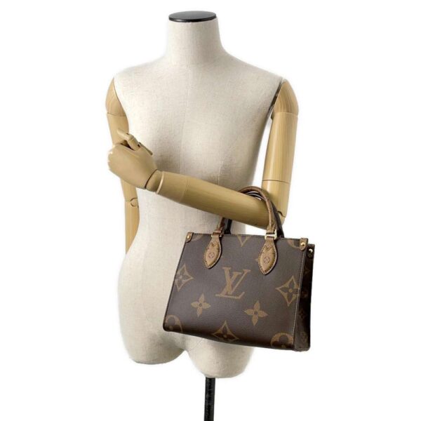 9603134 04 Louis Vuitton On The Go PM Monogram Reverse Handbag