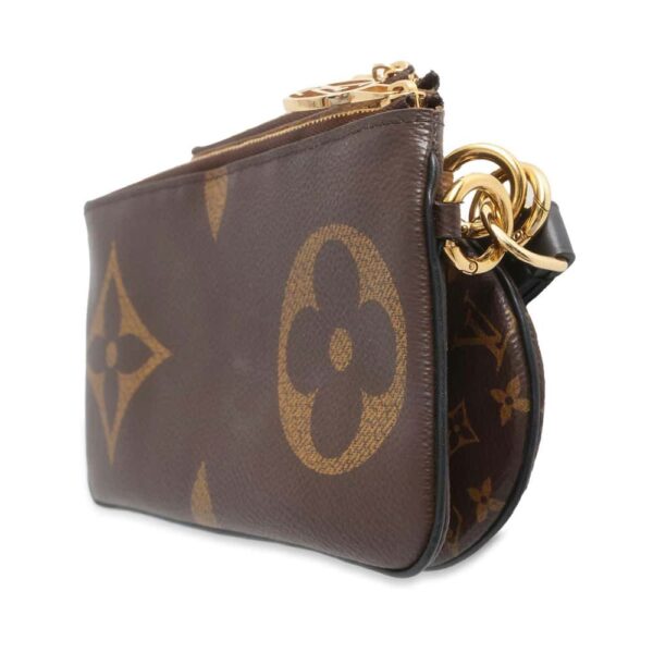 9725218 02 Louis Vuitton Monogram Reverse Giant Pochette Trio Canvas Pouch