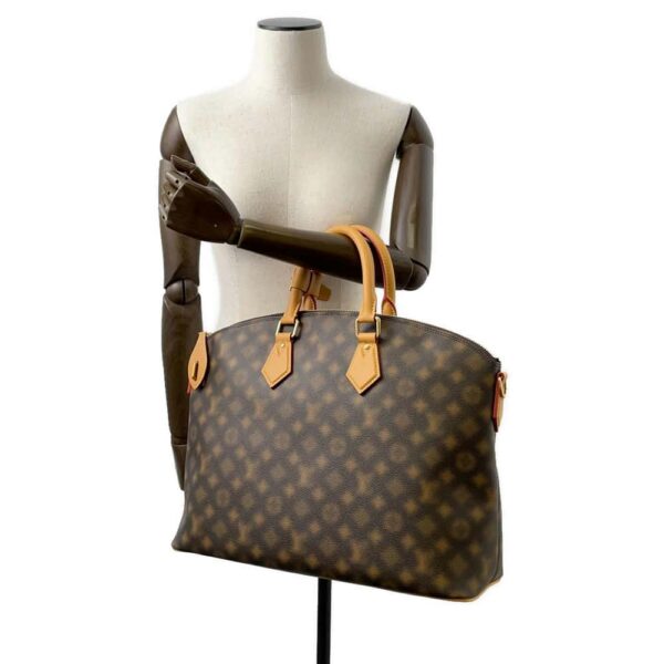 9760493 04 Louis Vuitton Neo Lockit MM Monogram Handbag