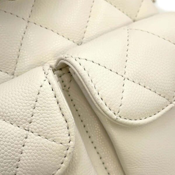 9792234 07 Chanel Matelasse Coco Mark Caviar Skin Backpack White