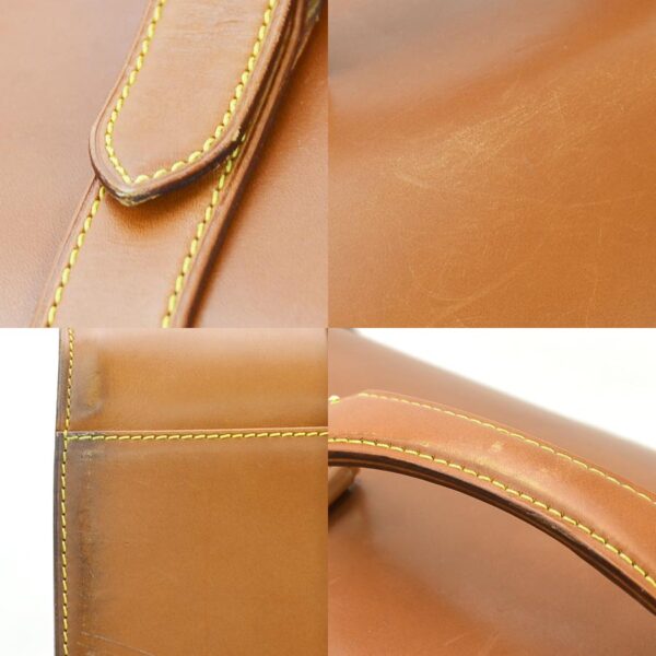 98826a 4 Louis Vuitton Nomad Leather Travel Bag Caramel