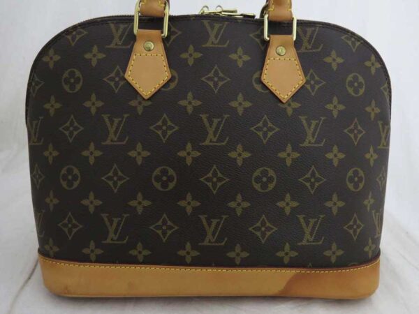 e51194a 1 Louis Vuitton Alma Monogram Canvas Handbag Brown