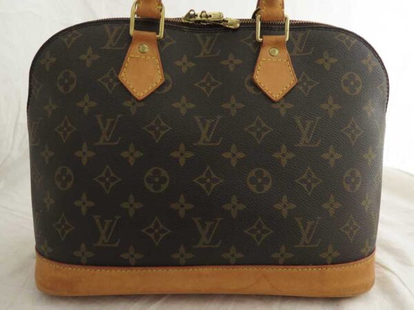 e51492a 1 Louis Vuitton Alma Monogram Canvas Handbag Brown