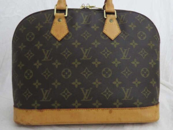 e51903a 1 Louis Vuitton Alma PM Monogram Canvas Handbag Brown