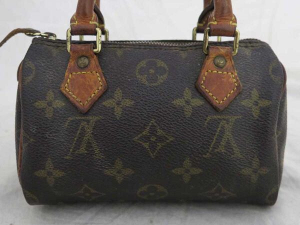 e51995a 1 Louis Vuitton Mini Speedy Monogram Canvas Handbag Brown