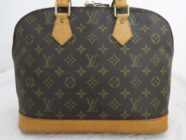 e52296a 1 Louis Vuitton Alma PM Monogram Canvas Handbag Brown