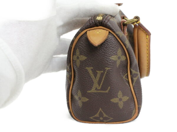 imgrc0074184201 Louis Vuitton Mini Speedy Accessory Pouch Monogram Canvas