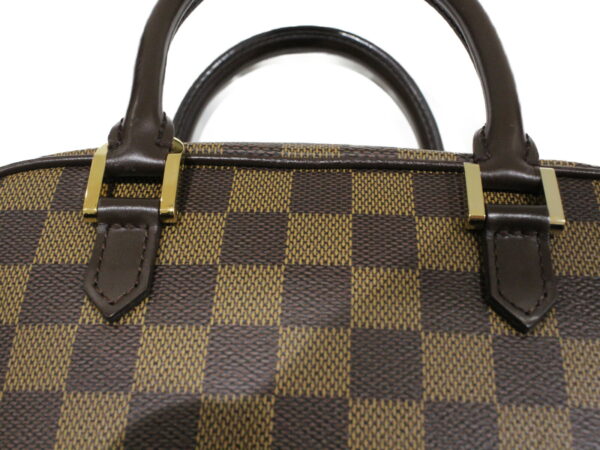 imgrc0074232387 Louis Vuitton Saria Mini Handbag Damier Ebene Brown