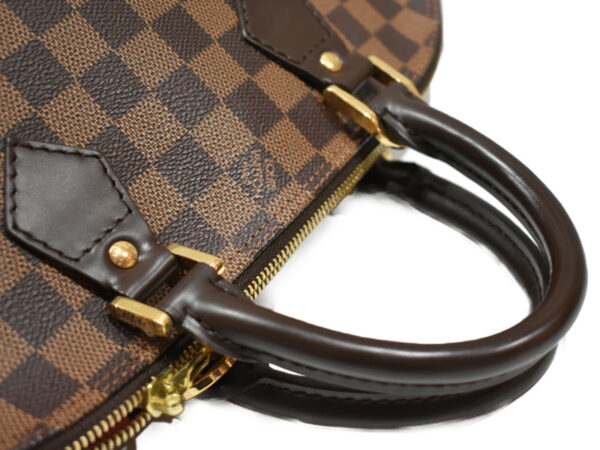 imgrc0075372790 Louis Vuitton Alma Damier Handbag