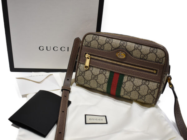 imgrc0076613396 Gucci GG Supreme Mini Bag Coating Brown