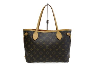 imgrc0076664761 Louis Vuitton Excursion Monogram Handbag Brown