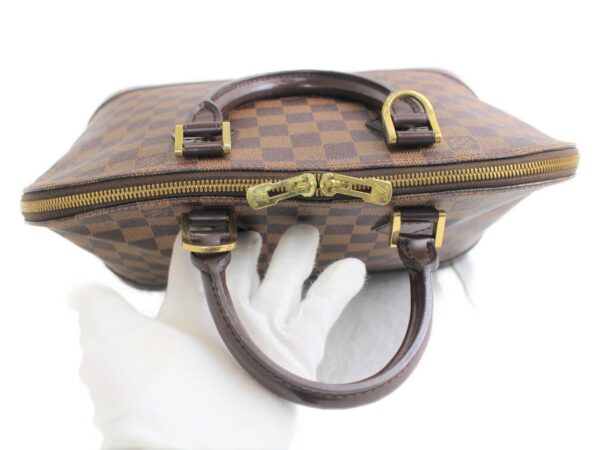 imgrc0076695680 Louis Vuitton Alma PM Damier Ebene Handbag